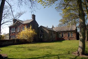 The former school house and old school buildings April 2007